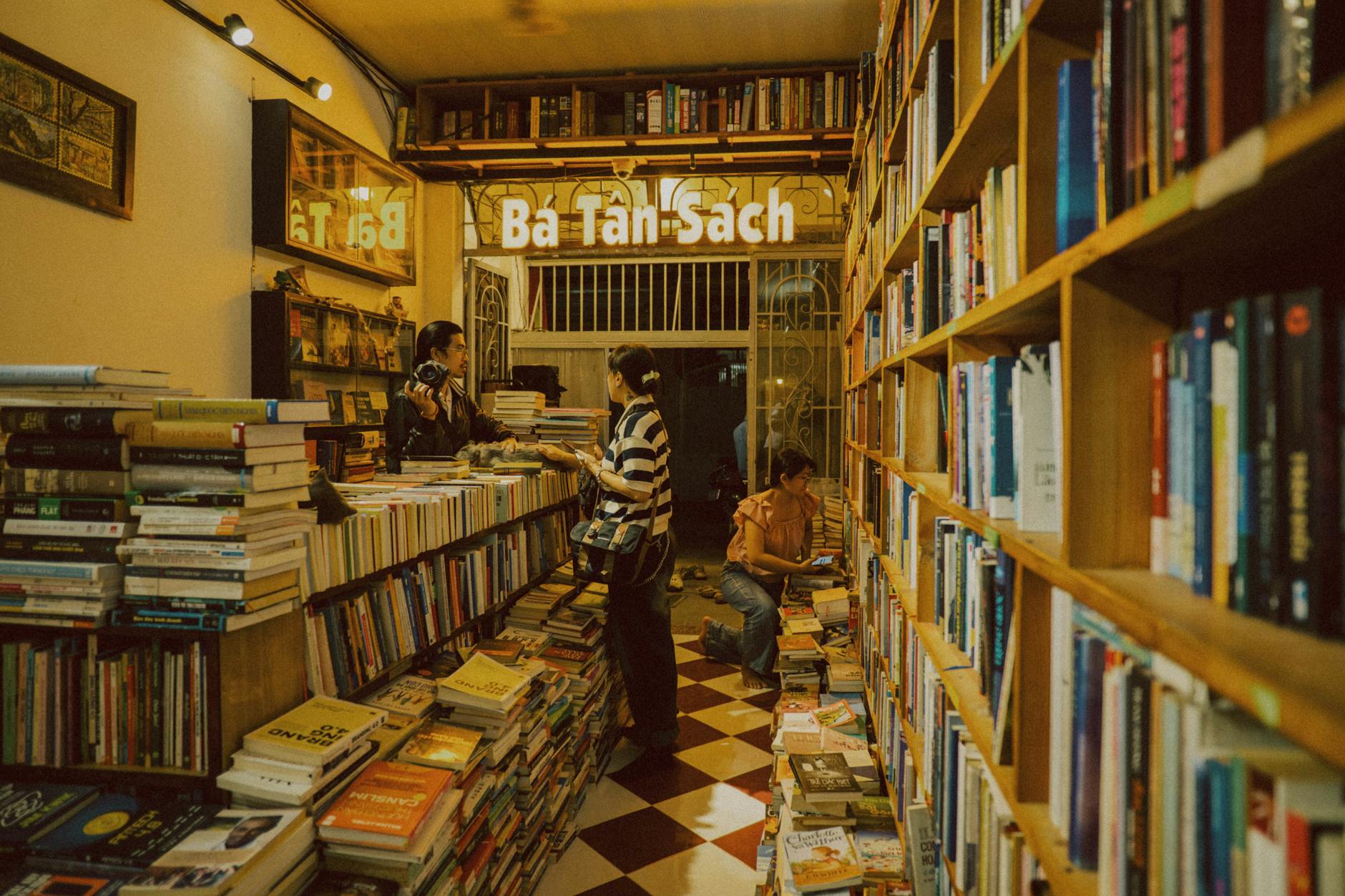 Cozy independent bookstore interior with shelves of books and reading area