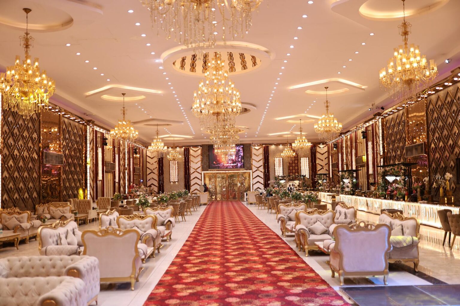 Elegant ballroom with round tables and chairs set for formal event
