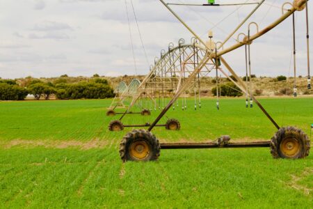How Water Scarcity Is Driving Agricultural Technology Stock Performance Modern irrigation system watering crops in agricultural field