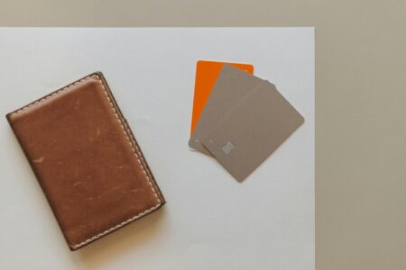 Multiple credit cards arranged in a leather wallet showing different card designs