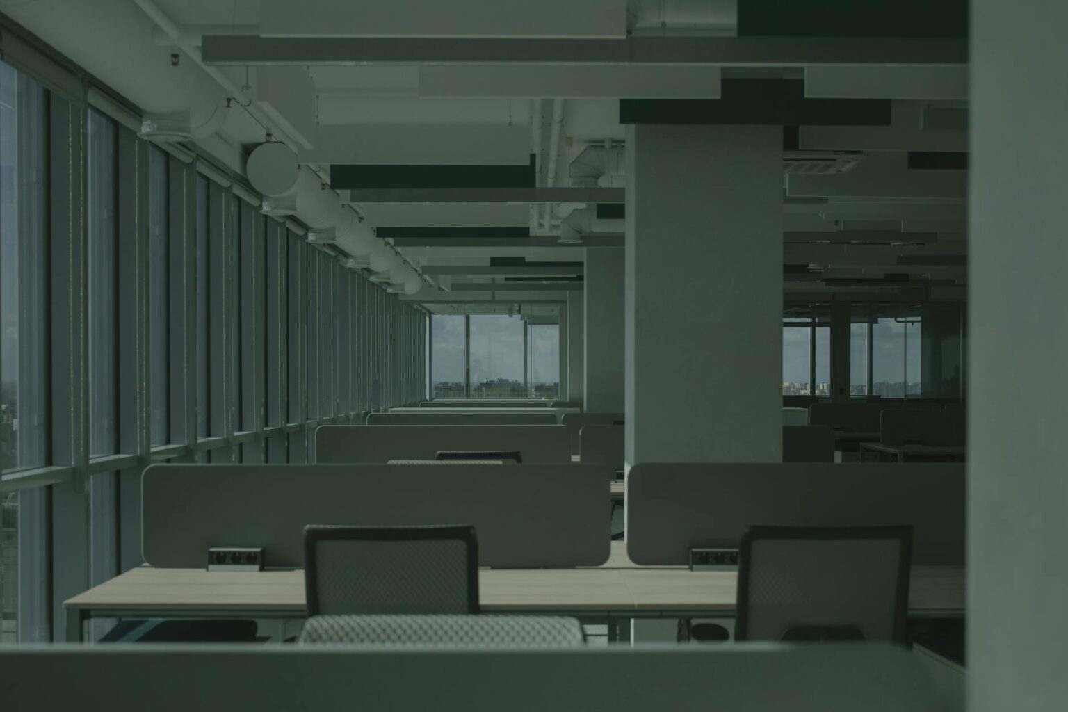 Empty modern office building with vacant floors showing the impact of remote work on commercial real estate
