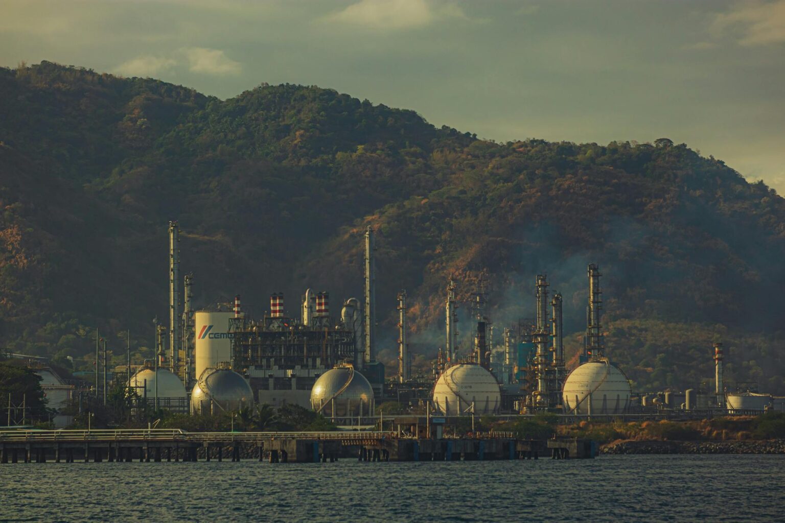 Water Scarcity Creates Investment Opportunities in Desalination Technology Companies Modern water treatment facility with large industrial pipes and processing equipment