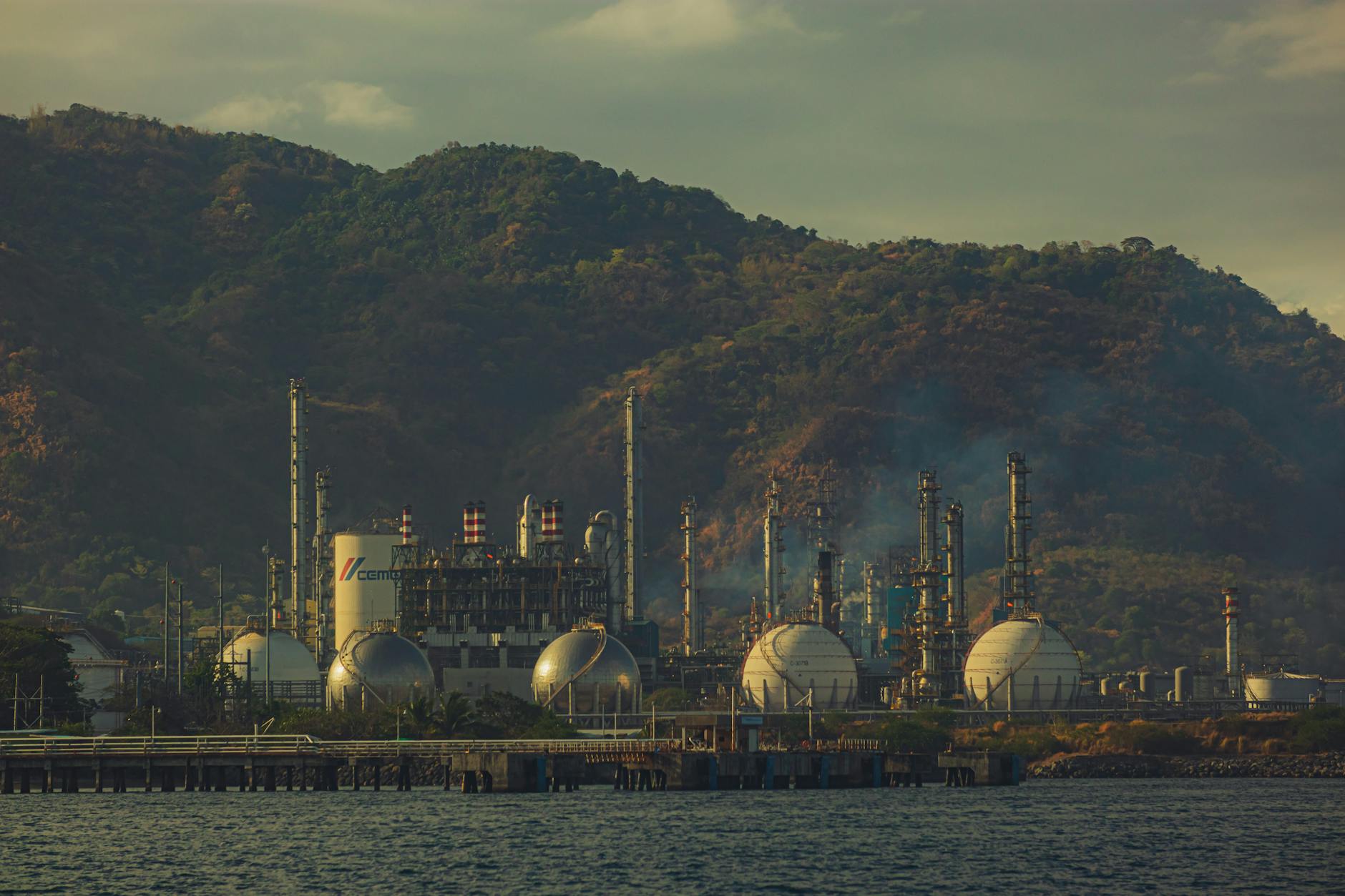 Modern water treatment facility with large industrial pipes and processing equipment