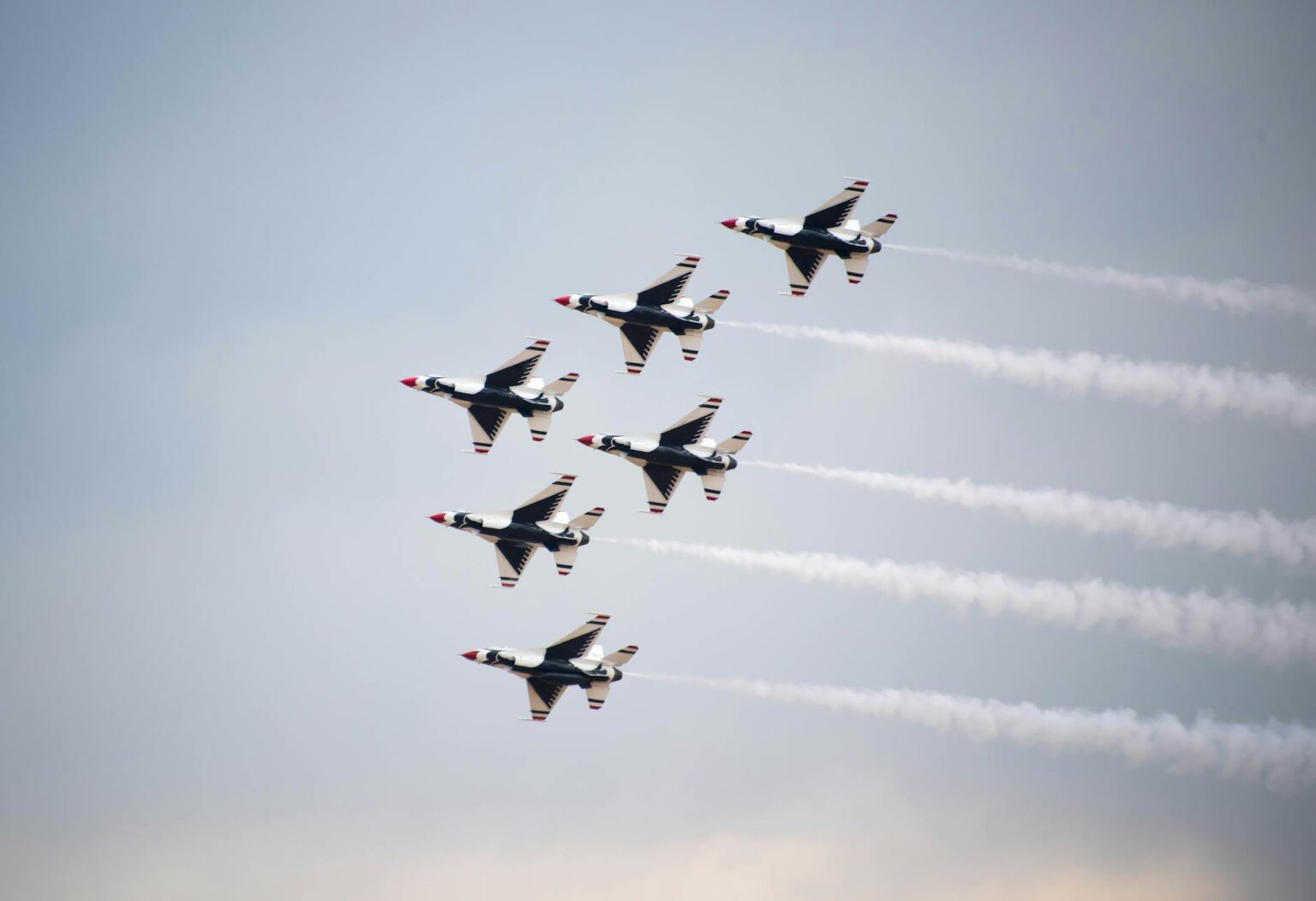 Defense Contractor Stocks Rally Amid Global Security Spending Increases Modern military fighter jets on runway representing defense industry growth