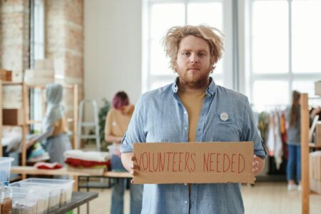 How Corporate Volunteer Programs Are Becoming Major Tax Strategy Tools Corporate employees participating in volunteer activities in modern office setting