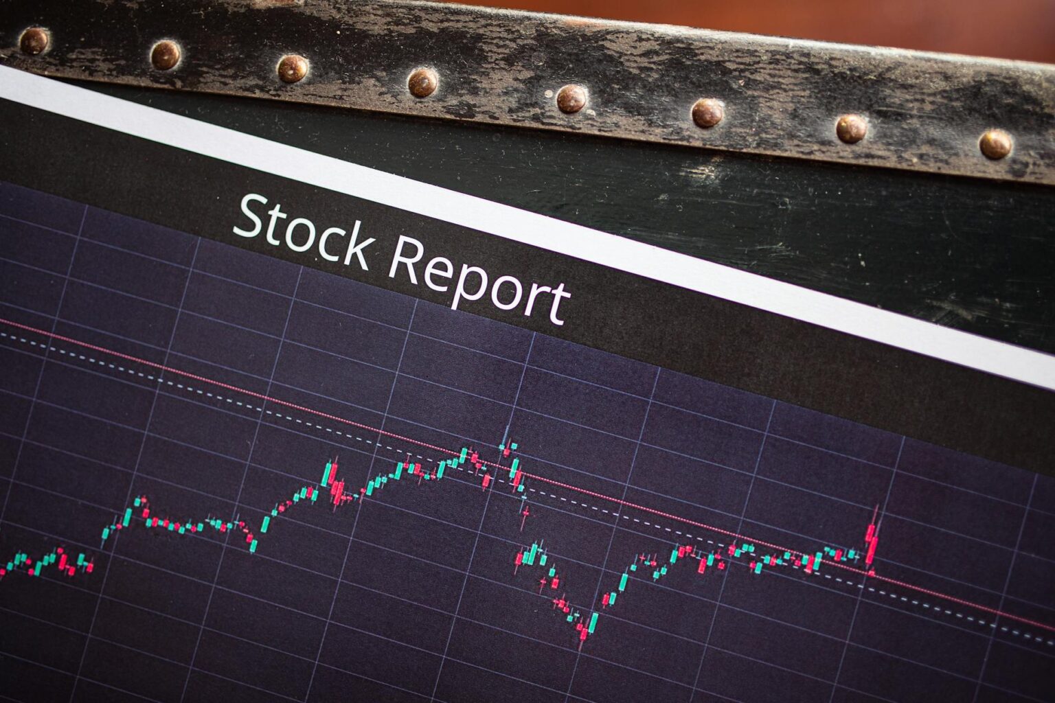 Financial charts showing stock market performance and dividend yield trends