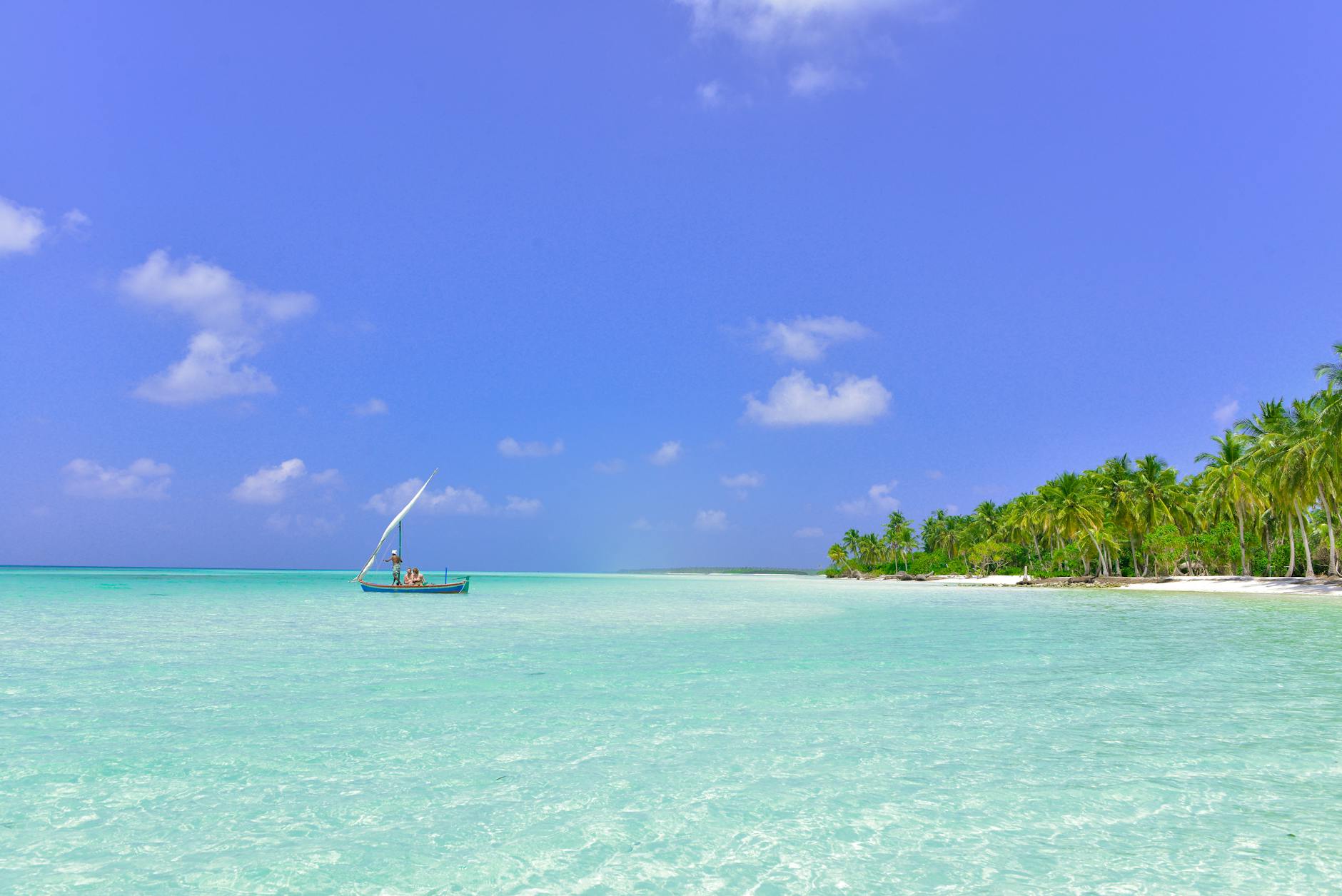 Person relaxing on beach representing work-life balance and time off benefits