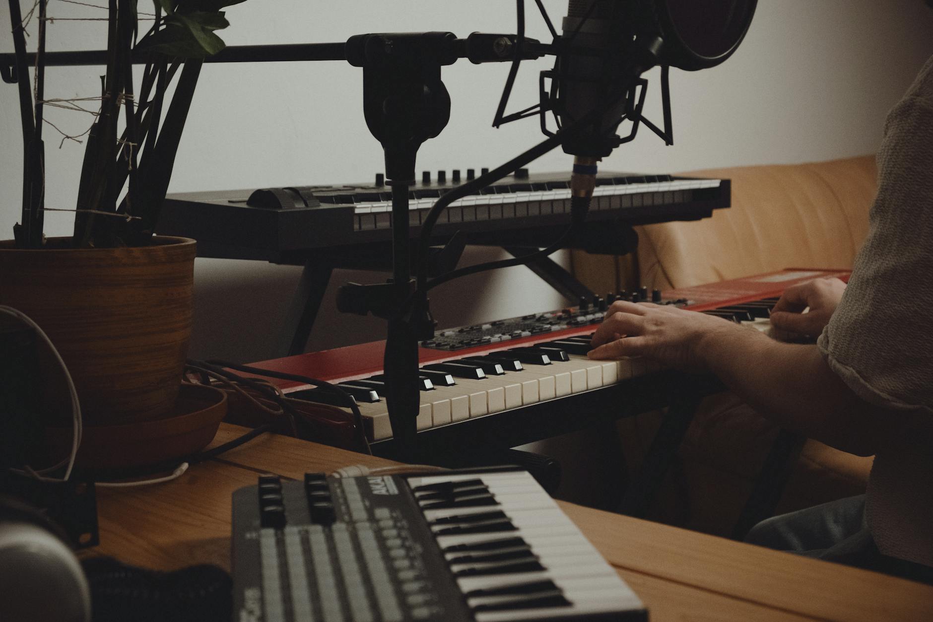 Small home recording studio with microphone and audio equipment