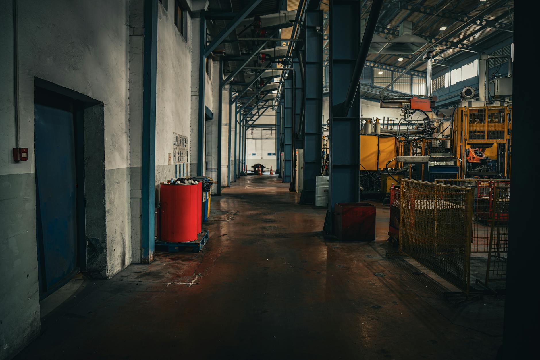 Modern manufacturing facility interior with industrial equipment and assembly lines