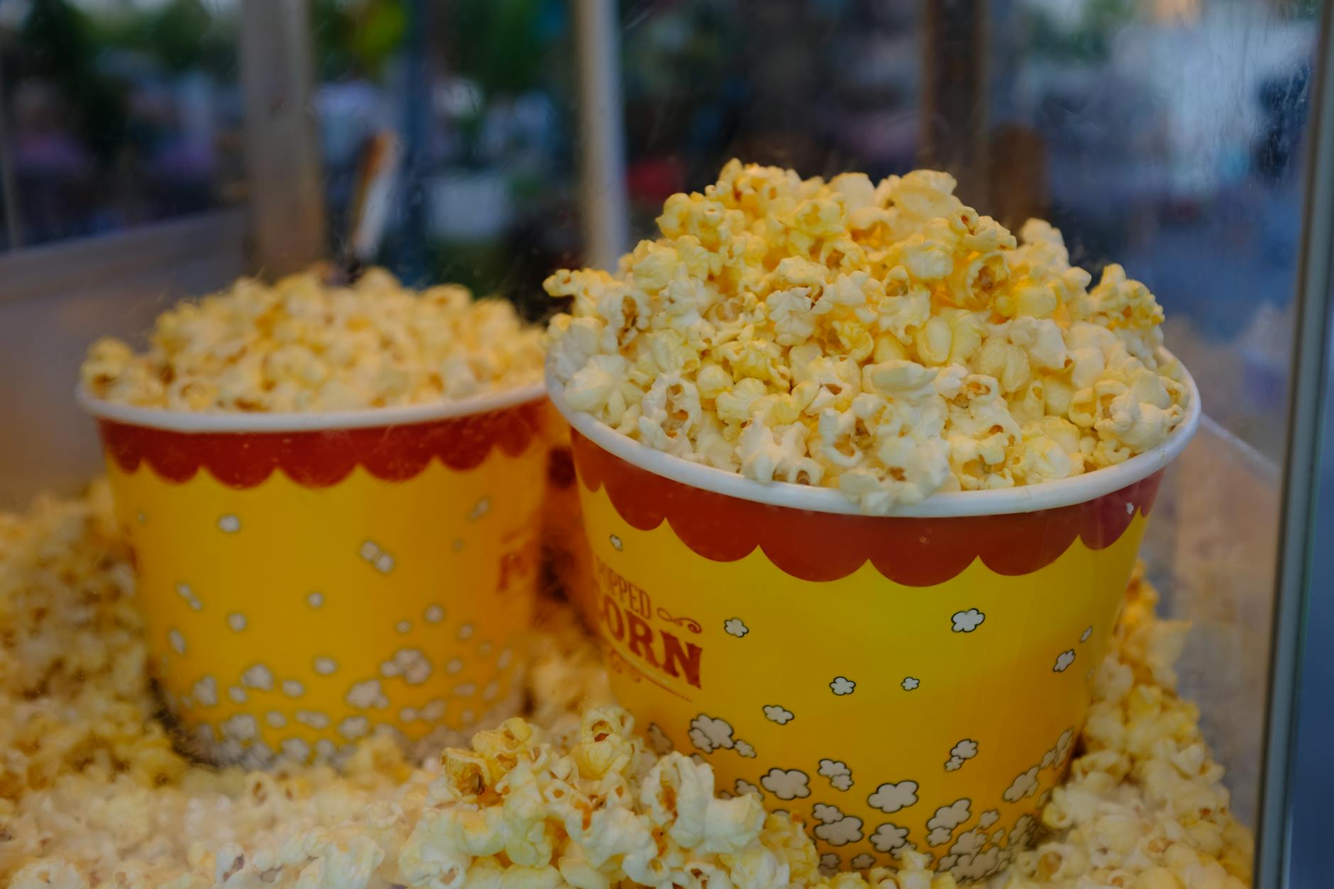 Fresh popcorn in containers at movie theater concession stand