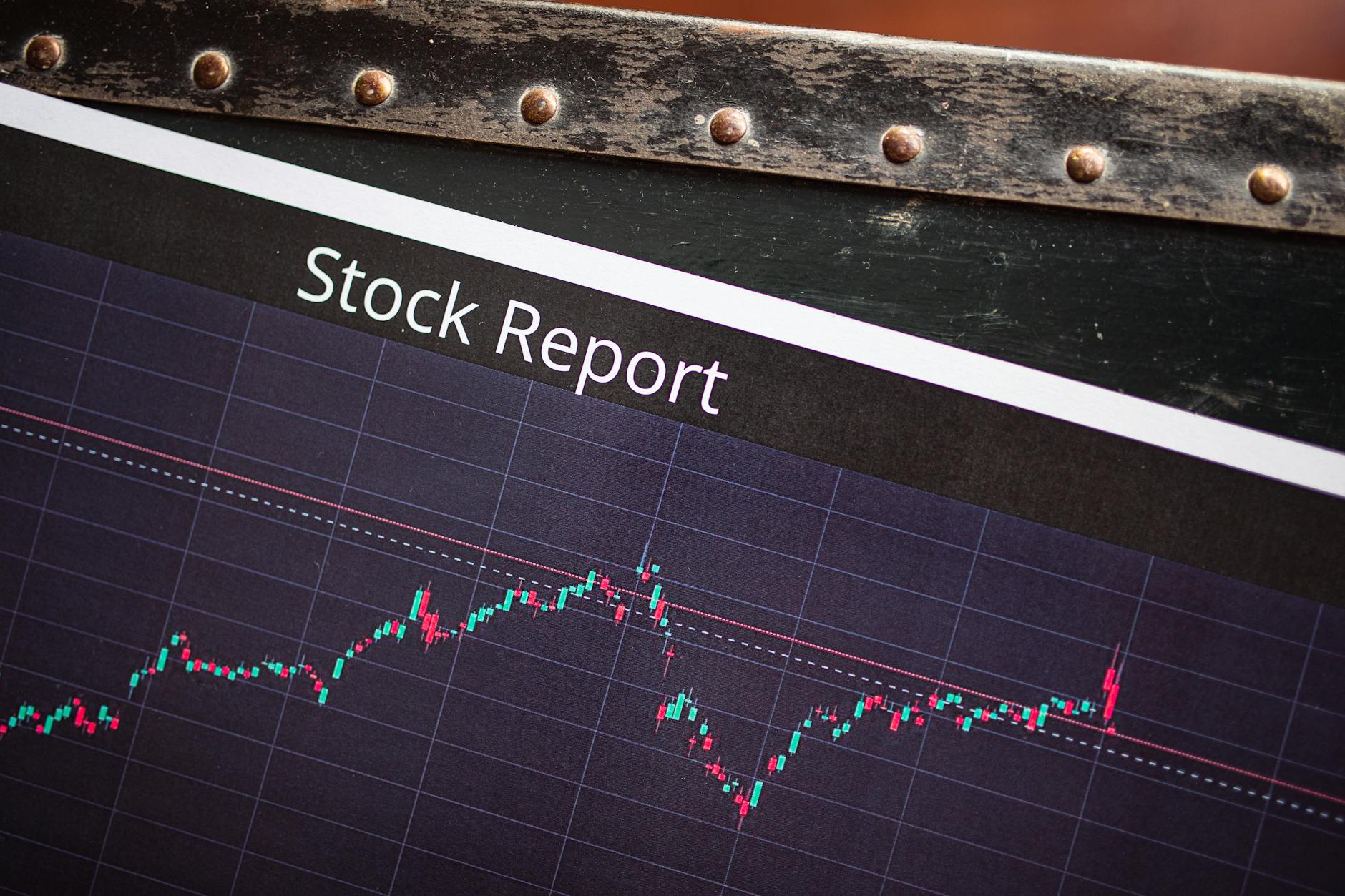Financial charts and graphs showing stock market performance and investment analysis data