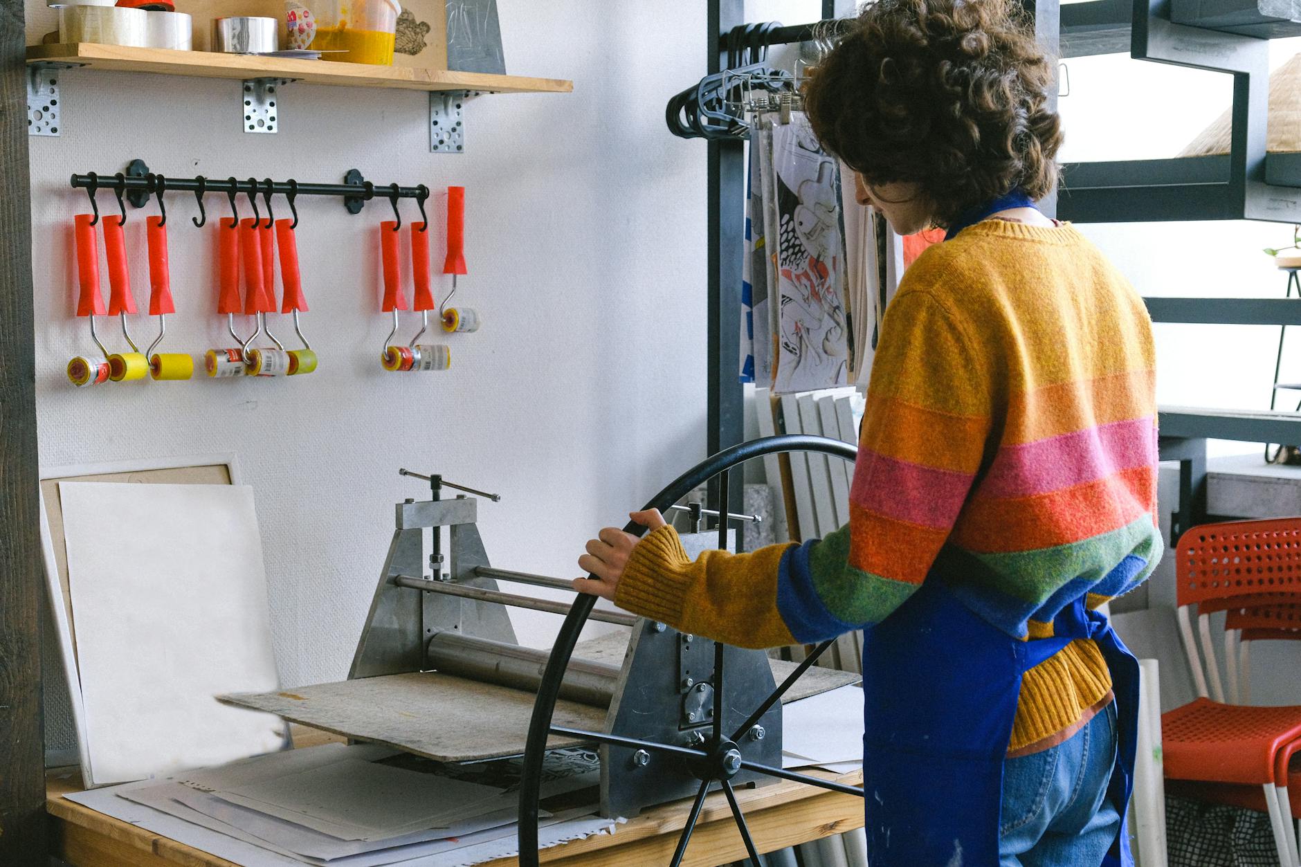 Professional printing equipment in a modern print shop workspace