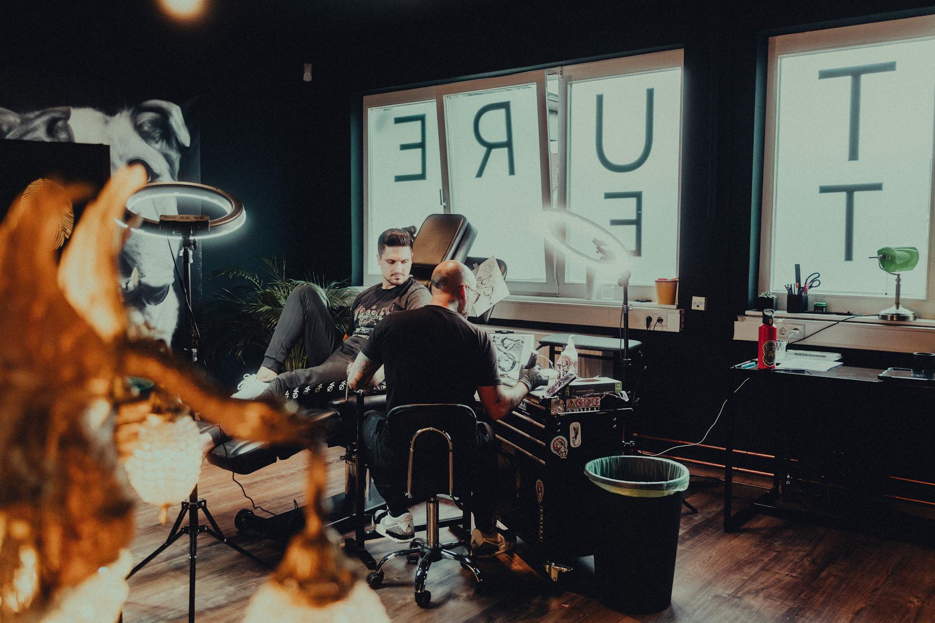 Clean modern tattoo studio with minimal decor and professional lighting