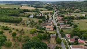 Farmland REITs Are Quietly Outperforming During Food Inflation Aerial view of green agricultural farmland with crop rows stretching to the horizon