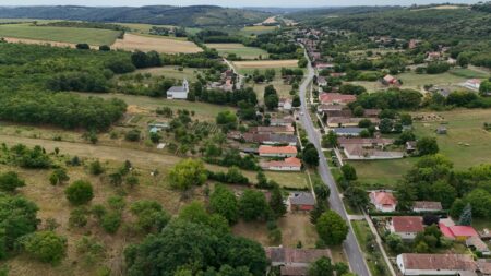 Farmland REITs Are Quietly Outperforming During Food Inflation Aerial view of green agricultural farmland with crop rows stretching to the horizon