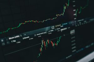 Preferred Stock ETFs Draw Income Investors Amid Rate Uncertainty Financial charts showing income investment performance trends on a monitor screen