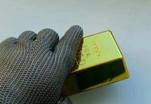 Gold ETFs See Renewed Inflows as Geopolitical Tensions Persist Stacked gold bars representing gold as a safe-haven asset for investors