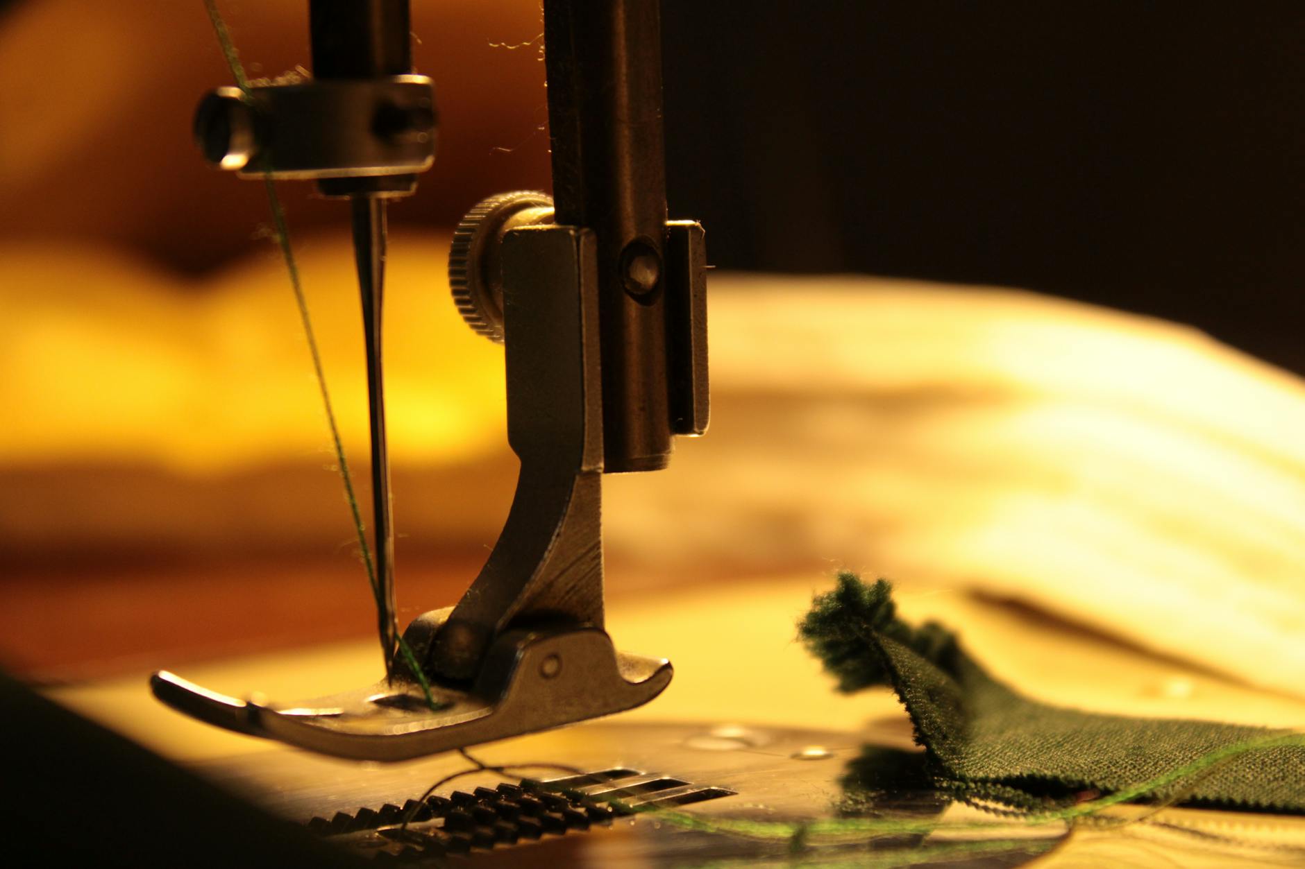 Industrial sewing machine in dry cleaning shop alteration area