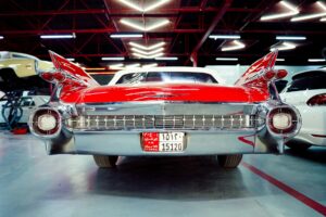Classic car being restored in auto repair shop garage