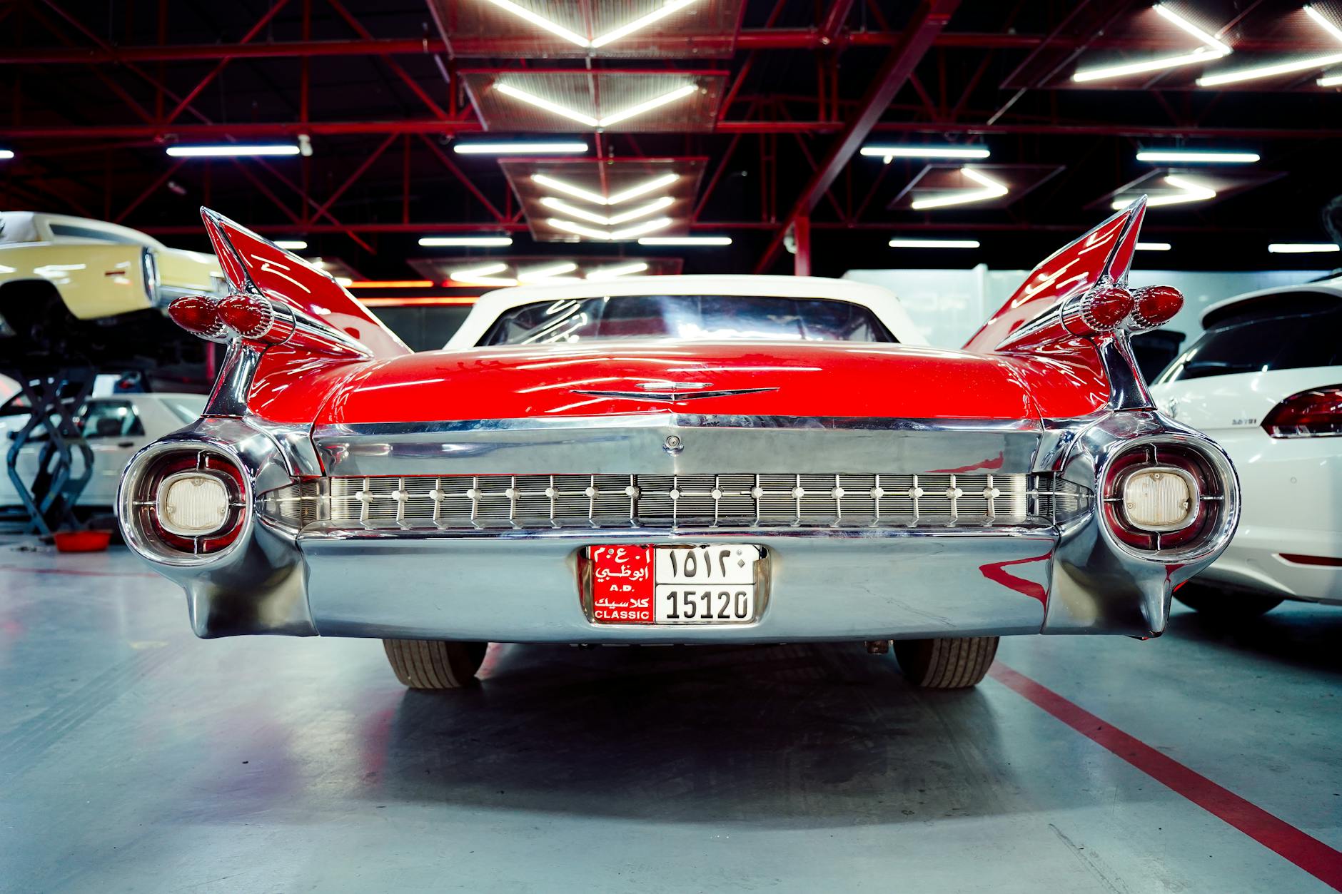 Classic car being restored in auto repair shop garage