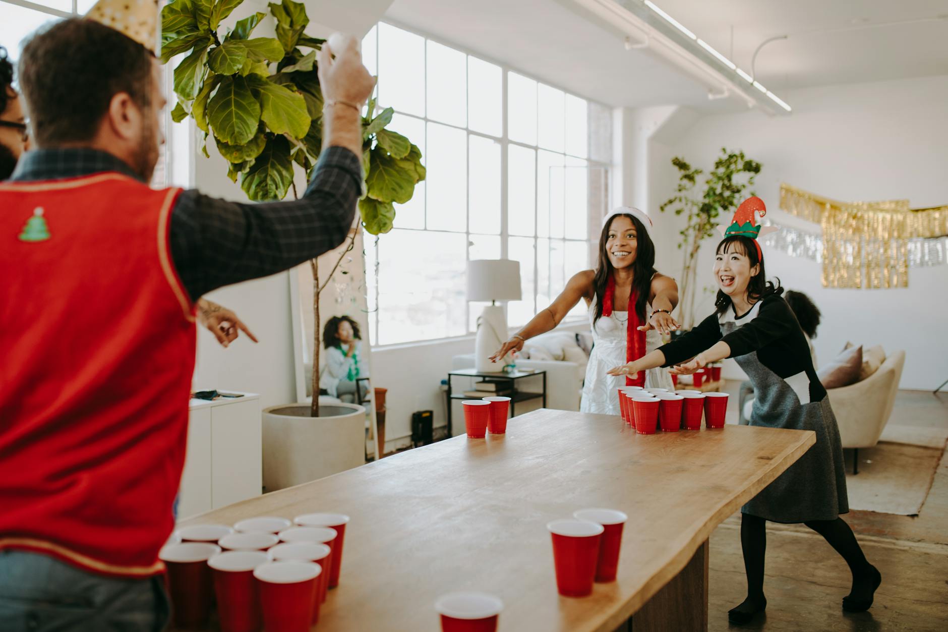 Group of office employees collaborating during an indoor team-building activity