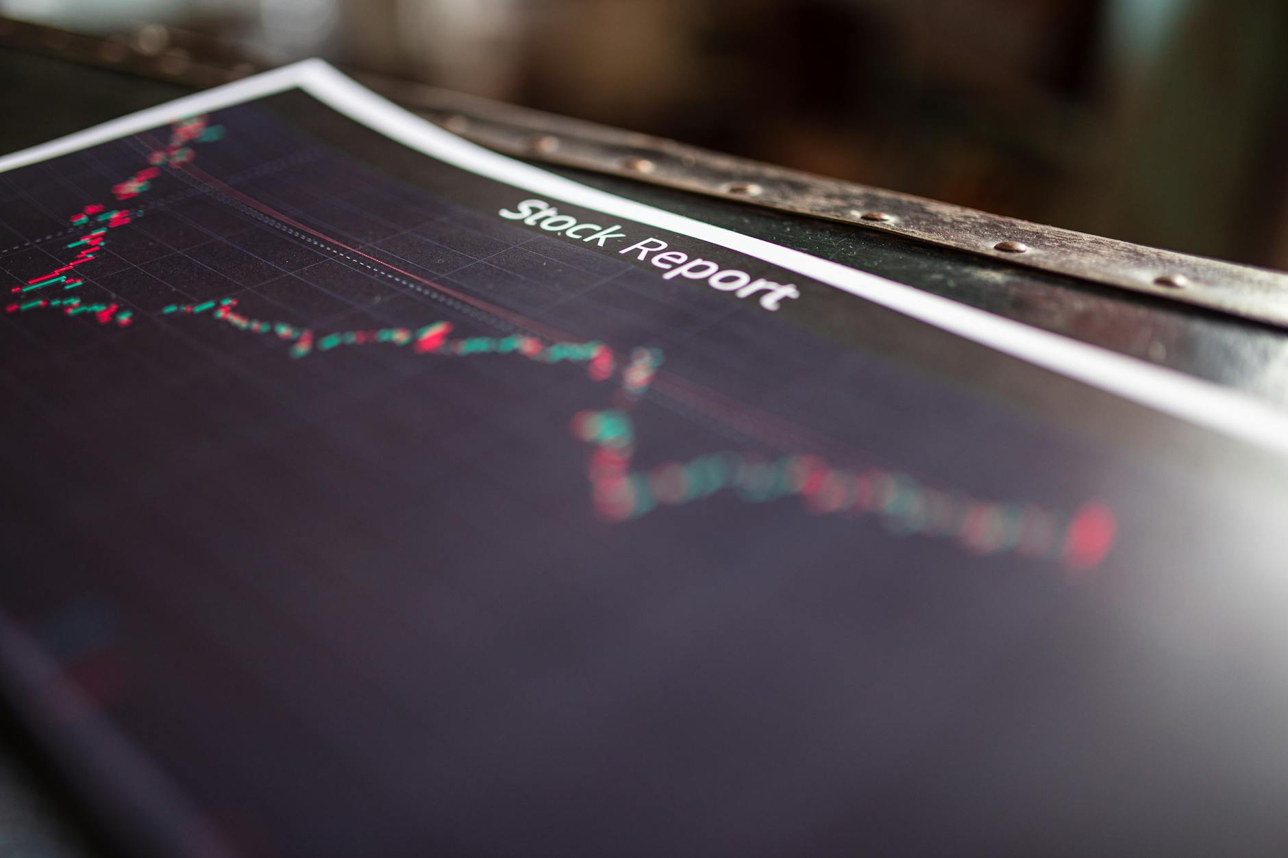 Financial charts and graphs on a computer screen showing investment performance data