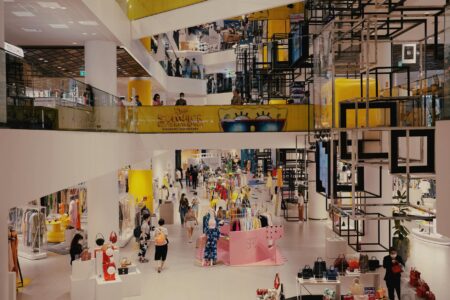Private Credit Funds Quietly Expand Into Middle-Market Retail Lending Interior of a mid-size retail store with merchandise displays and lighting