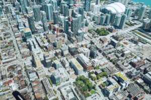 Aerial view of a major US city skyline showing commercial and residential real estate