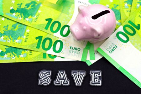 Self-Directed IRA Holders Quietly Shift Into Private Credit Deals Person reviewing retirement account documents and financial statements at a desk