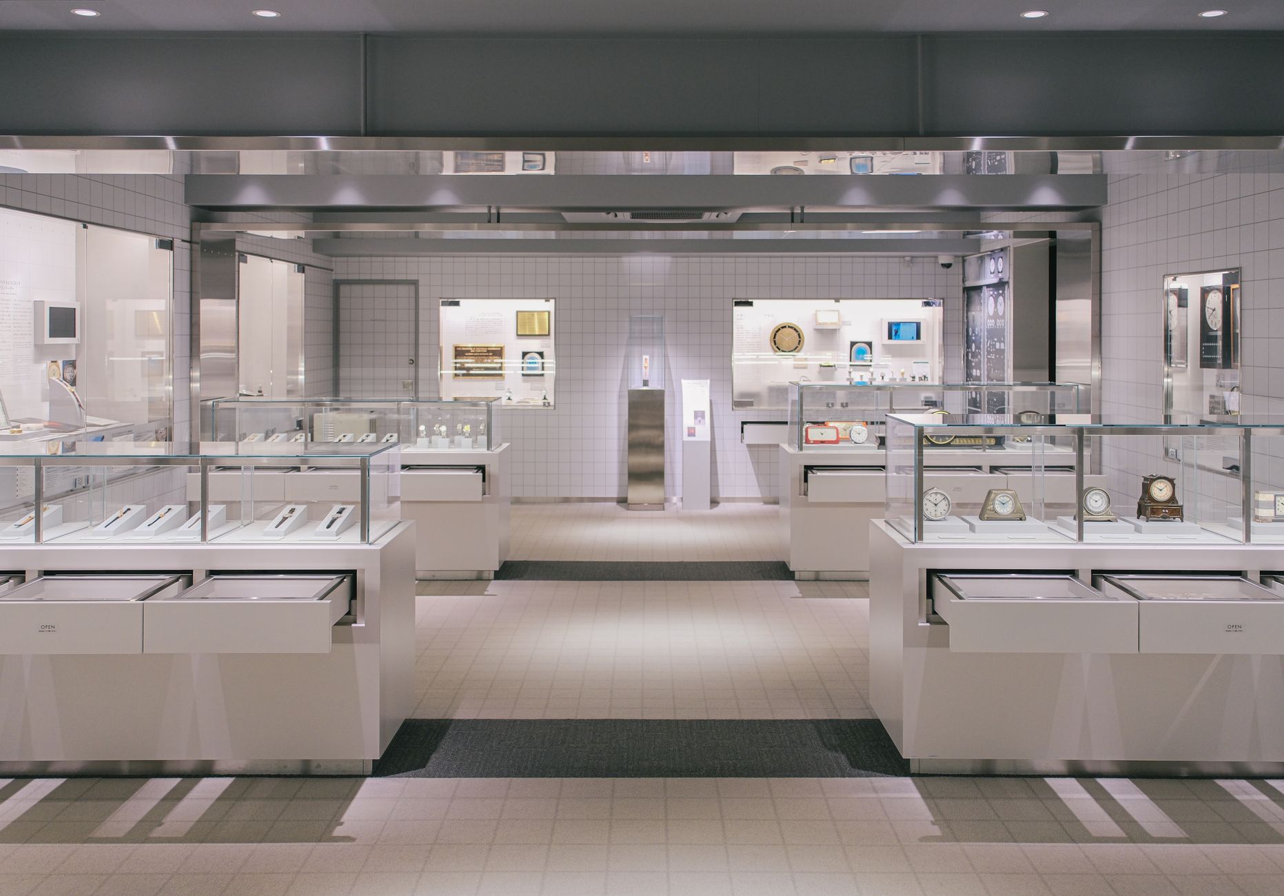 Several luxury mechanical watches displayed on a velvet surface