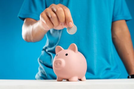 Person reviewing a high-yield savings account on a laptop computer