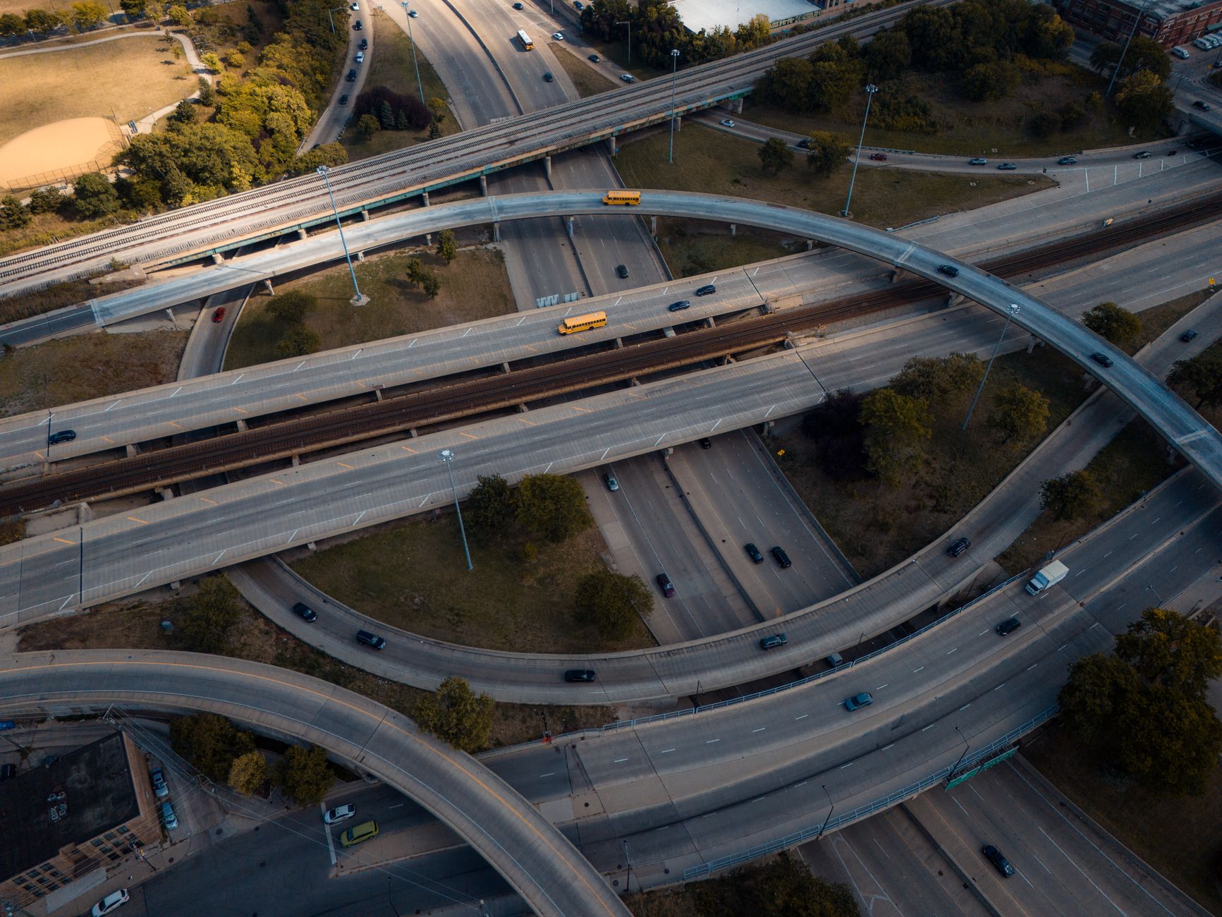 Aerial view of highway infrastructure and toll roads representing long-duration infrastructure assets