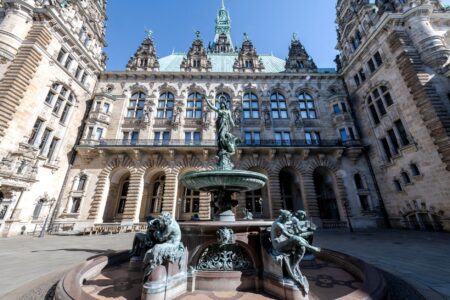 Government municipal building representing local bond issuers behind municipal money market funds