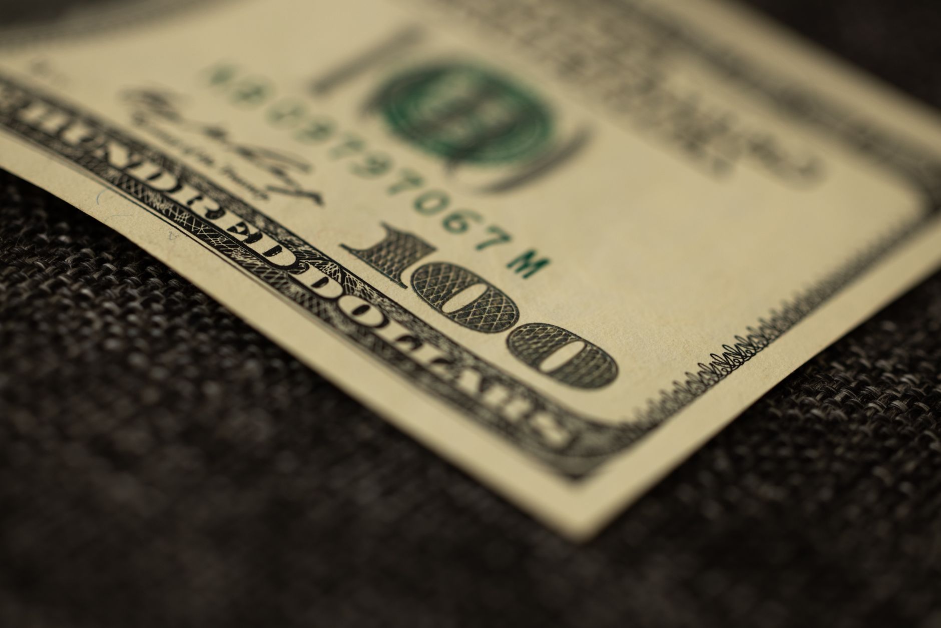 Paper savings bonds and financial documents representing government bond investments