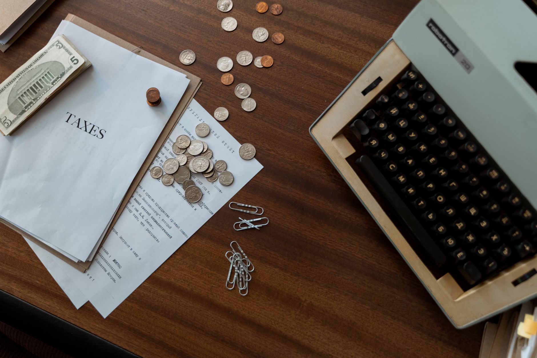 Tax documents and financial paperwork laid out on a desk representing tax-exempt income planning