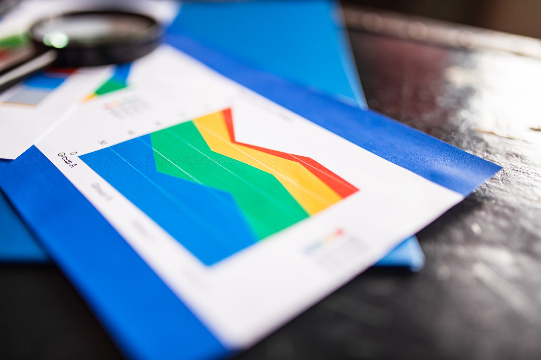Close-up of financial documents and charts representing private credit fund analysis