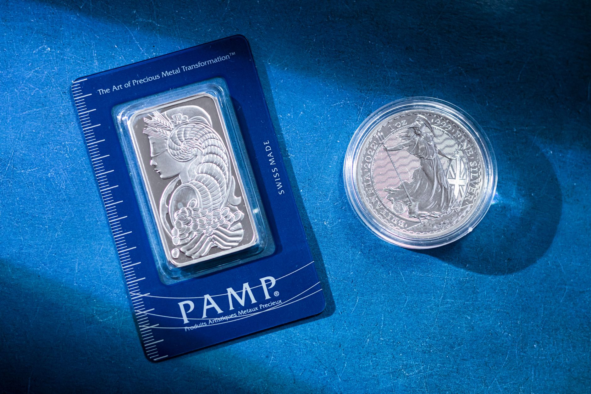 Stack of polished silver bars representing precious metals investment