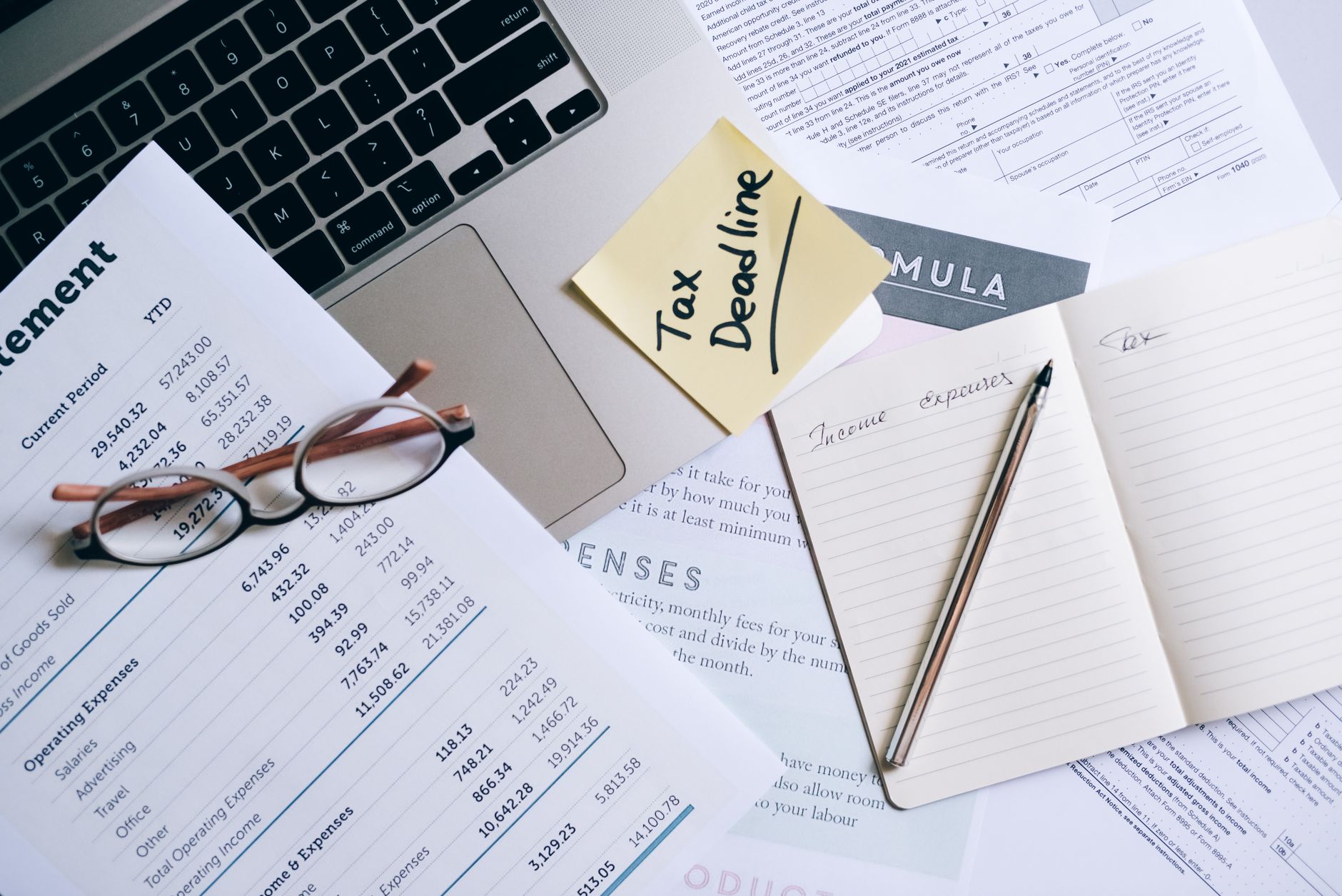 Tax and financial planning documents on a desk