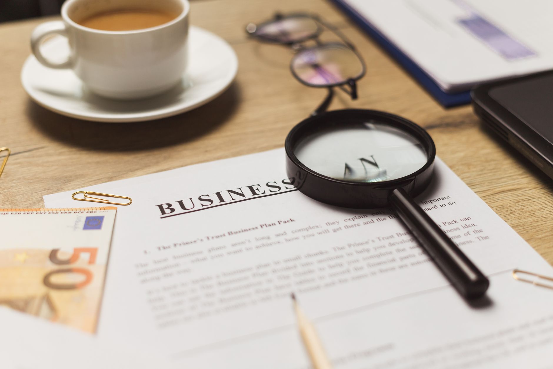 A person reviewing fixed income investment documents at a desk