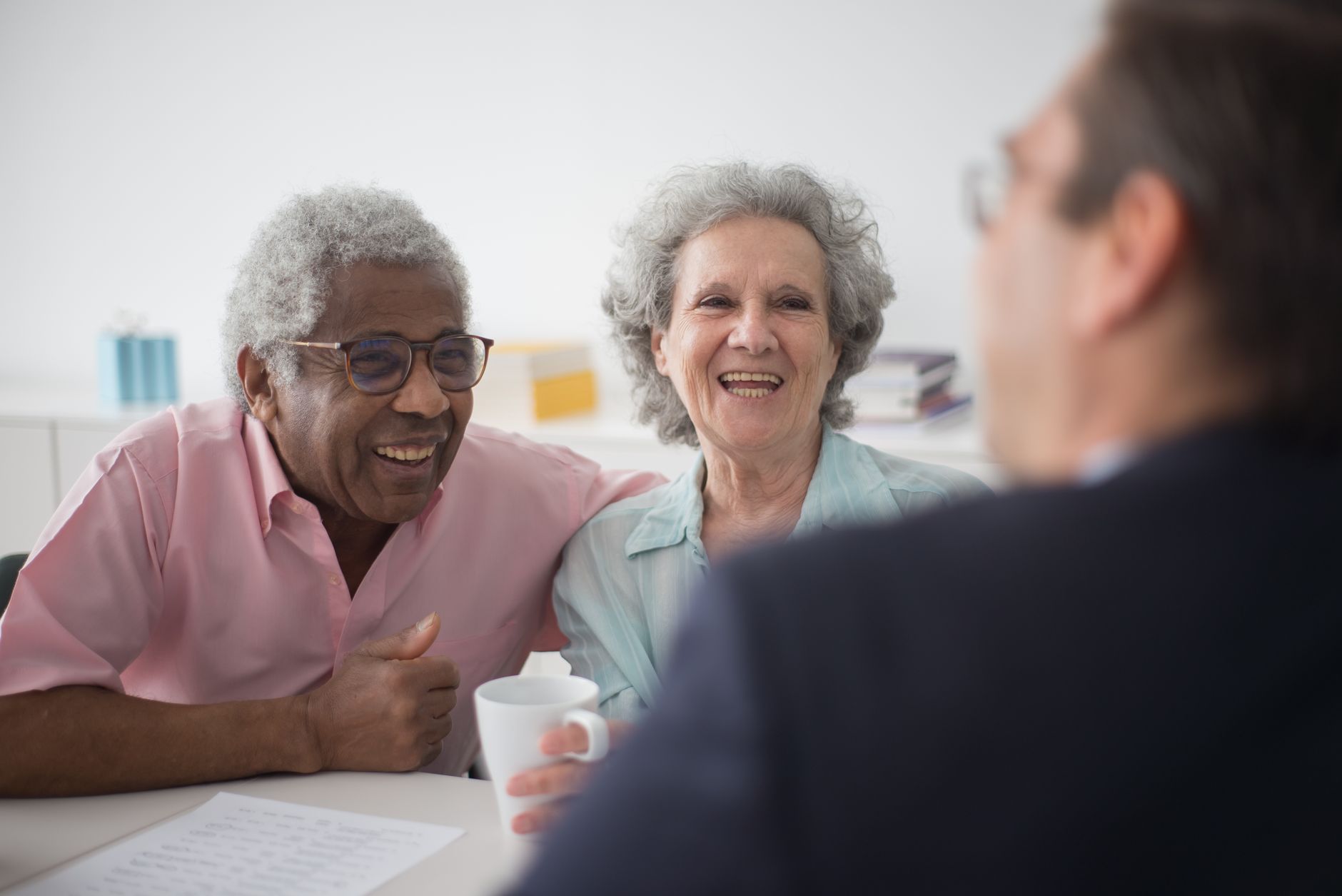 Person reviewing retirement financial documents and investment options