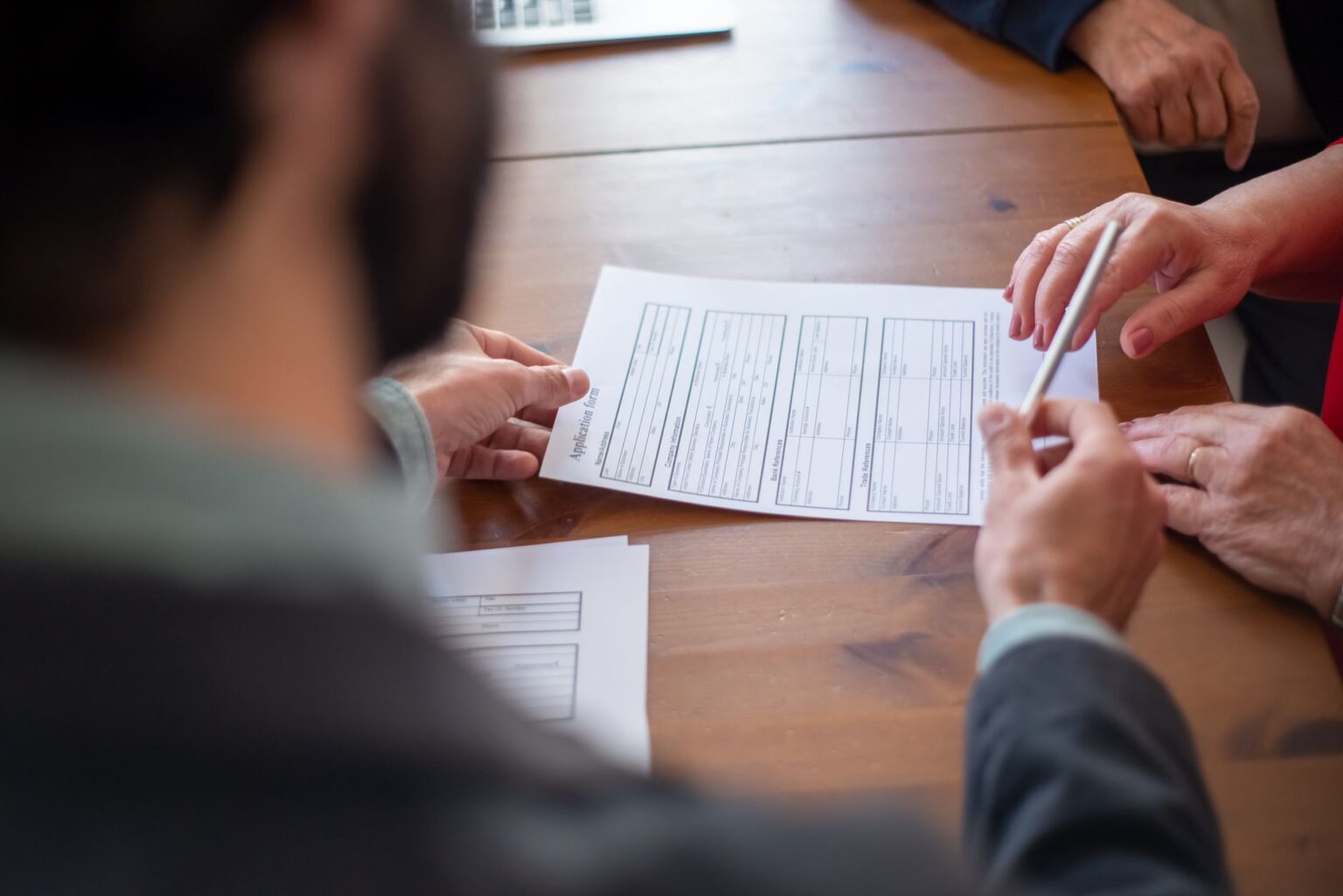 Reinsurance Sidecars Quietly Attract Institutional Capital Seekers Close-up of an insurance contract document on a desk, representing reinsurance agreements