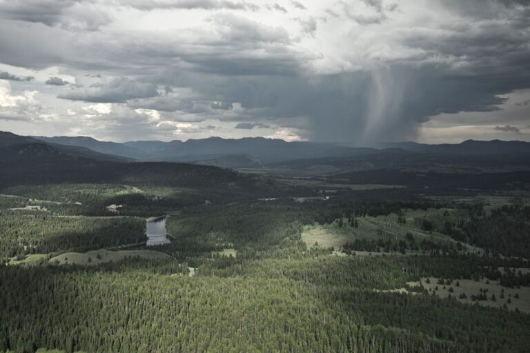 Dark storm clouds viewed from above representing catastrophic weather risk