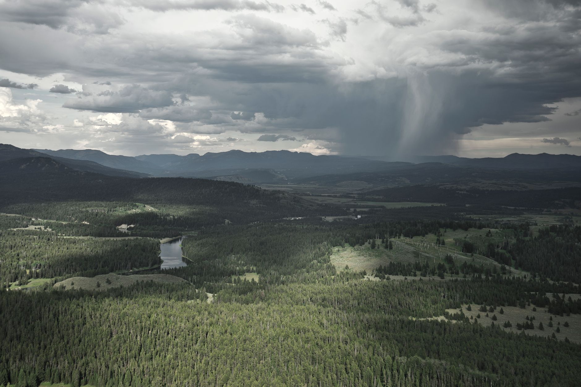 Dark storm clouds viewed from above representing catastrophic weather risk