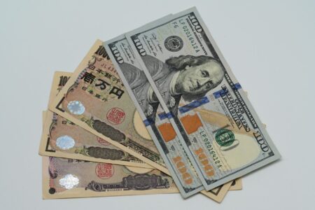 Currency exchange board showing international rates representing dollar weakness and emerging market dynamics