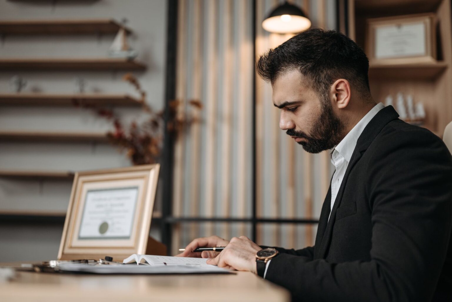 Defined Maturity Bond ETFs Quietly Fill Laddering Gaps for Advisors Financial documents and bond certificates on a desk representing fixed income investing