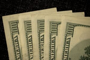 Floating Rate Treasury ETFs Quietly Attract Duration-Wary Allocators Close-up of U.S. Treasury bond certificates representing government fixed income securities