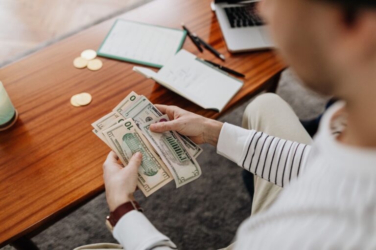 Equity-Linked CDs Quietly Resurface Among Capital-Preservation Seekers A bank desk with financial documents representing certificate of deposit products