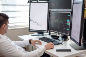 Commodity Trading Advisors Quietly Resurface as Equity Correlations Rise Multiple financial trading screens displaying commodity futures and market data