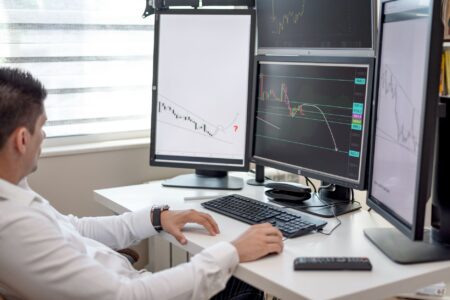 Commodity Trading Advisors Quietly Resurface as Equity Correlations Rise Multiple financial trading screens displaying commodity futures and market data
