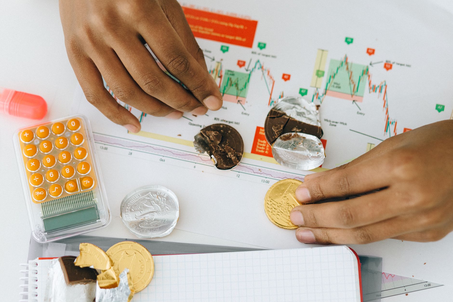 Business professionals analyzing portfolio performance charts in an office setting